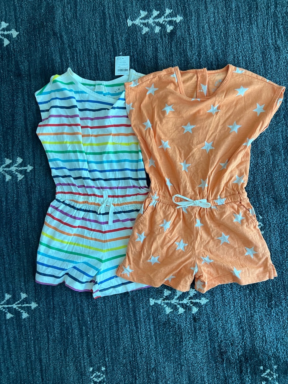 Lot of 2 Primary kids Rompers- Orange (Cantaloupe) Stars and Rainbow Stripe- 6/7